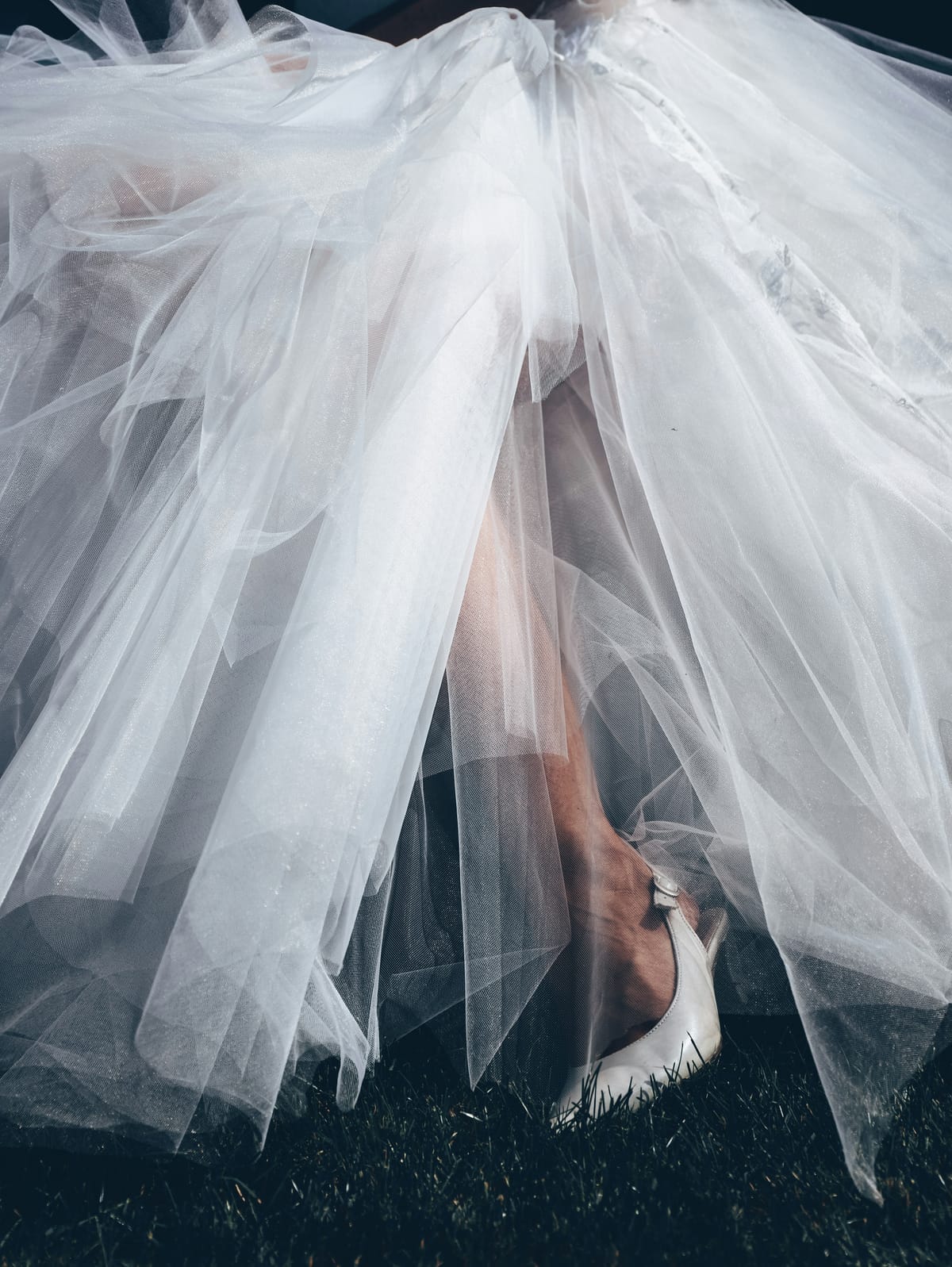 A delicate veil and gown detail