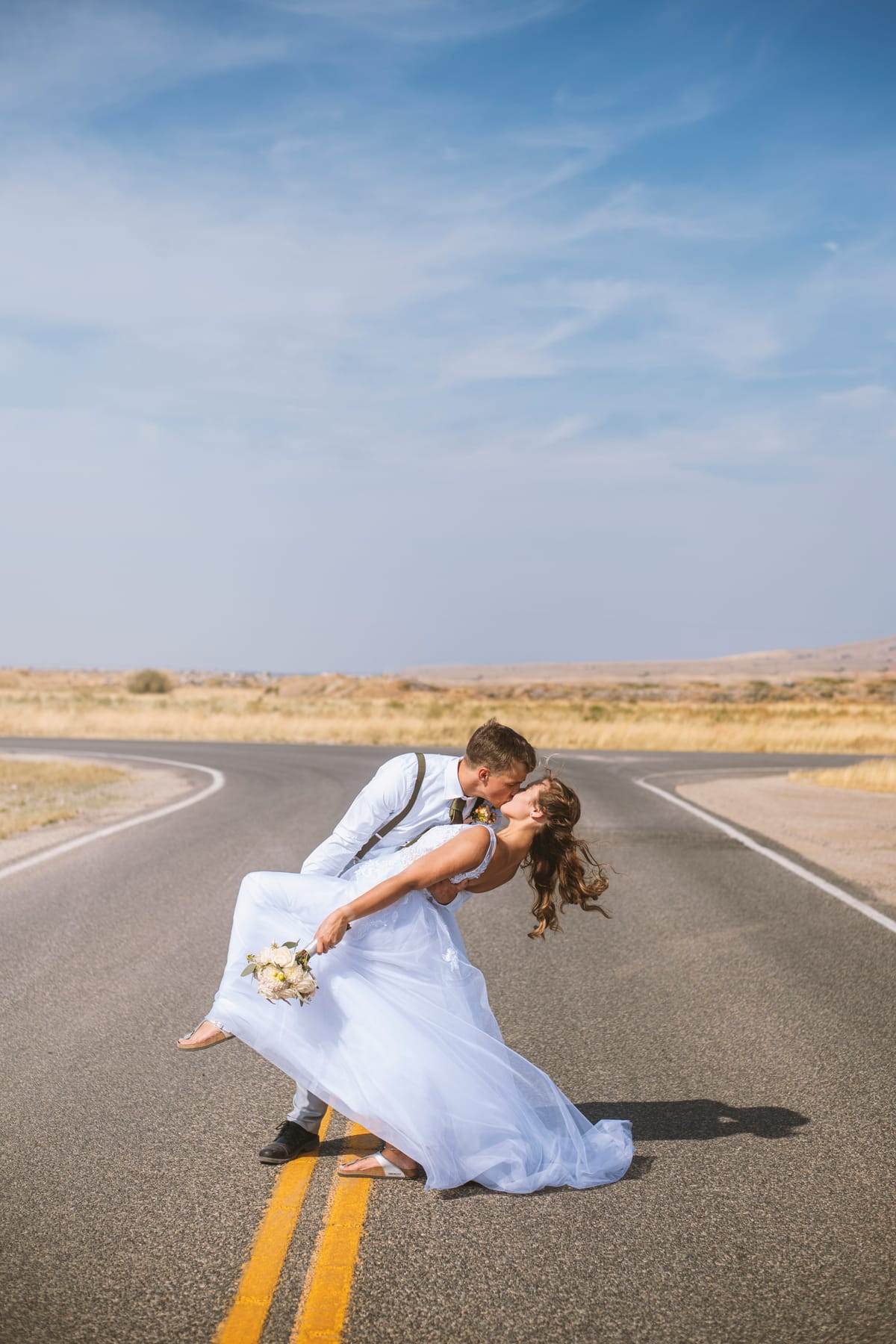 A couple sharing a kiss at their ceremony