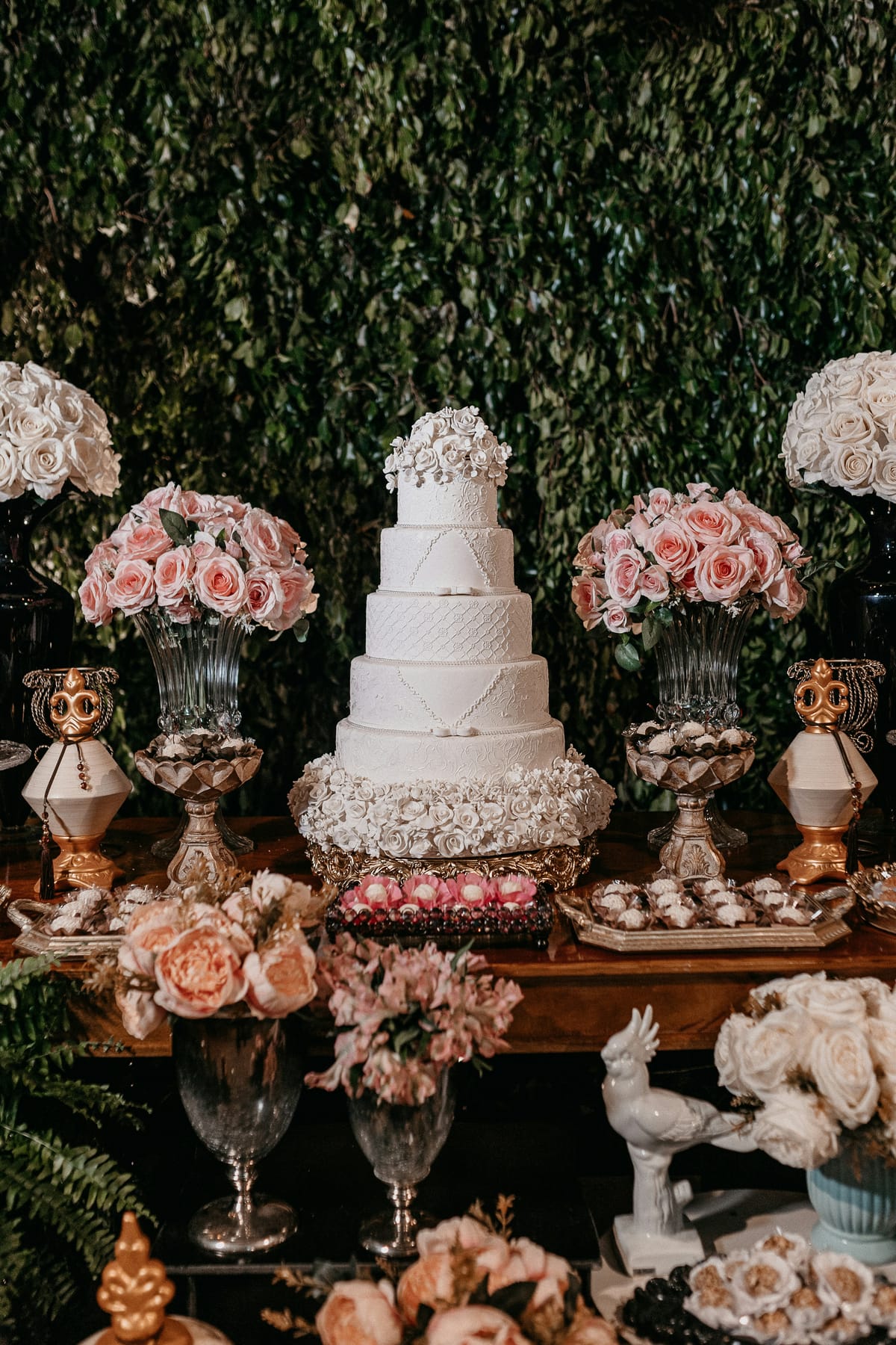 A tiered wedding cake dressed with florals